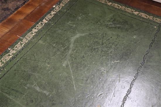 A Victorian mahogany partners writing table, with green gilt tooled leather inset top W.150cm